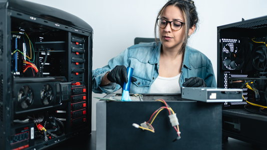 Woman cleaning her PC for a healthier computer