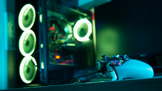 photo of a gaming pc and a video game controller