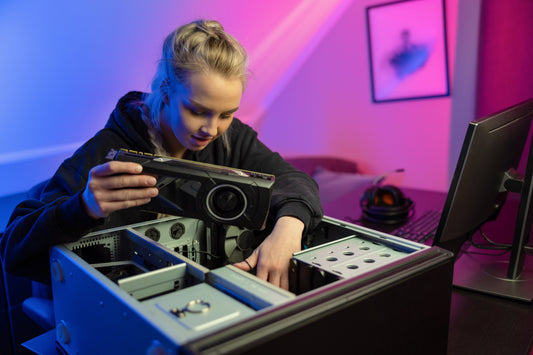 image of a woman upgrading a part of her PC.